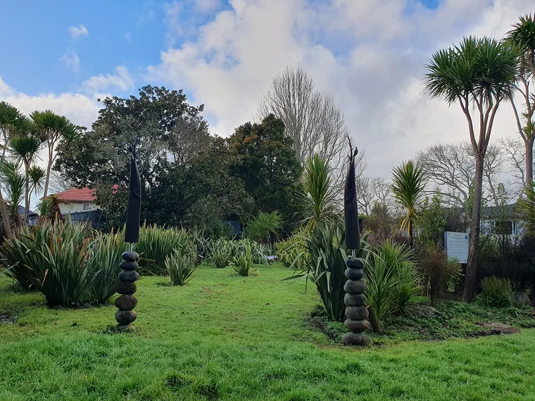 Harakeke plants in Te Pā Harakeke o te Iwi, a community weaving-material garden in West Auckland, New Zealand.